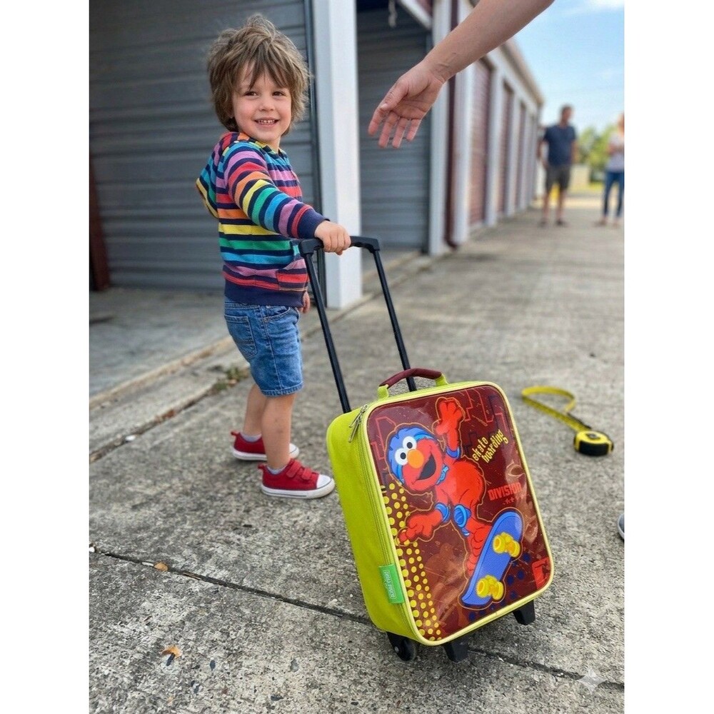 Rare Vintage Sesame Street Elmo Skateboarding Rolling Suitcase 2007
